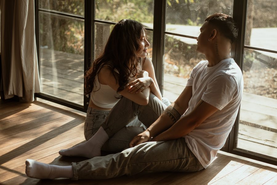 A couple talking at home